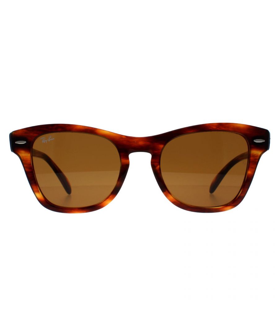 Ray-Ban Rectangle Unisex Striped Havana Brown RB0707S  Sunglasses are the perfect combination of classic design and modern sophistication, making them a must-have for any fashion-forward individual. Crafted with acetate frame, the 0707S sunglasses offer a comfortable and secure fit. The iconic Ray-Ban logo is featured on the temples, adding a touch of elegance to these sunglasses. These shades are perfect for both casual and formal occasions, making them versatile enough to wear all year round.