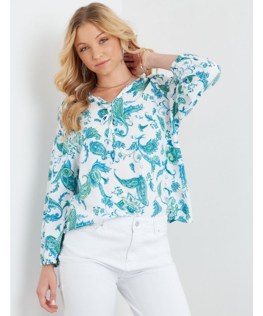 In a radiant paisley print, this light and airy blouse is destined to be one of your summer staples. With a long sleeve design that accommodates all body types, it is the perfect piece to wear on those sunny days out. The vneck neckline ensures that you can show off some bold prints without feeling too restricted, while the relaxed fit ensures that it will feel as comfortable as possible on any body type. Our classic white blouse is the perfect choice for any occasion. It's made from a lightweight and breathable fabric, so you'll feel comfortable in any weather condition. The neckband detail ensures that the collar stays in place, no matter how much you move around, while the long sleeves are perfect for keeping you warm on cool days. The fit is relaxed, so you can wear it as is or layer it up for an extra boost of style. -- The softest of whispers caresses your skin like a lover's touch as you slip this blouse over your head. Made from light, airy fabric, it slips easily over the body like a second skin and hugs every curve in all the right ways. Its vneck neckline is subtly sexy while its paisleys print adds delicate beauty to the piece. The fit is relaxed so that you can move and breathe easily in it, making it an ideal choice for summer days spent outdoors or just relaxing at home. This white blouse is beautifully printed with a paisley design. It's made from a lightweight and airy fabric, so you can wear it all year round without feeling too hot or sweaty. The long sleeves are perfect for cooling off in the summer heat, while the vneck neckline and comfortable neckband make it an ideal choice for any day or occasion. -- Welcome to our relaxed wear line! We know that finding the perfect blouse can be hard, but we're here to help. With a vneckline and white and blue print, this piece speaks for itself. Made with a relaxed fit for women of all body types, this blouse can be worn any day of the week. Whether it's hot weather or summer, this blouse fits the bill.Material:  100% Viscose