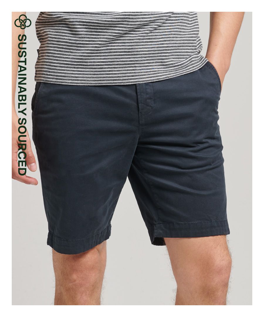 Chino shorts are a classic for a reason. Their tailored look makes any outfit feel complete, and our core chino shorts are no exception. It features a minimalist design and a wide range of colours so you can express yourself how you see fit.Slim fit – designed to fit closer to the body for a more tailored lookButton and zip fasteningBelt loopsTwo waist pocketsCoin pocketTwo-button back pocketsClassic Superdry patchesMade with organic cotton grown using natural rather than chemical pesticides and fertilisers. The healthier soil this creates uses up to 80% less water which is better for our planet and for the farmers who grow it.
