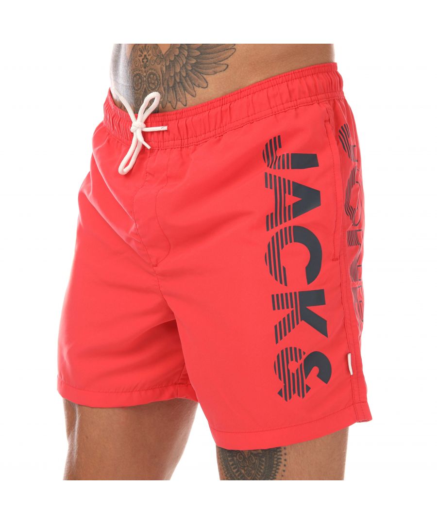 Mens Jack Jones Aruba Swim Shorts in red.-Elasticated drawcord waist.- Two slip pockets.- Mesh inner brief.- Printed branding.- Quick drying fabric.- Shell: 100% Polyester.- Ref: 12238045