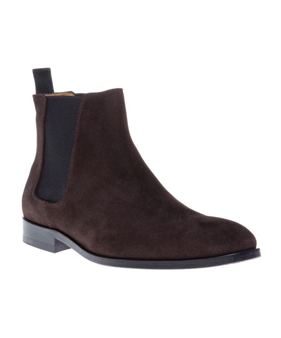 Constructed From Smooth Suede, These Dark Brown Mens Gerald Chelsea Boots By Paul Smith Feature Elasticated Side Gores And Black Grosgrain Heel Pulls. Finished With Smooth Leather Linings, This Timeless Pair Work Well With Both Tailored And Casual Trousers.