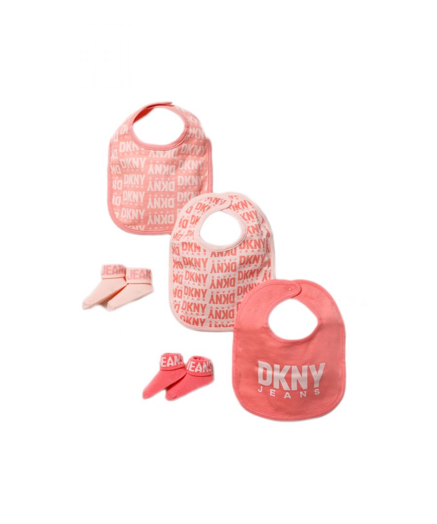 This adorable DKNY Jeans five-piece set includes three pink, printed bibs with the DKNY Jeans logo and two pairs of pink socks. This gift set is cotton keeping your little one comfortable. This would make a sweet gift for the little one in your life!