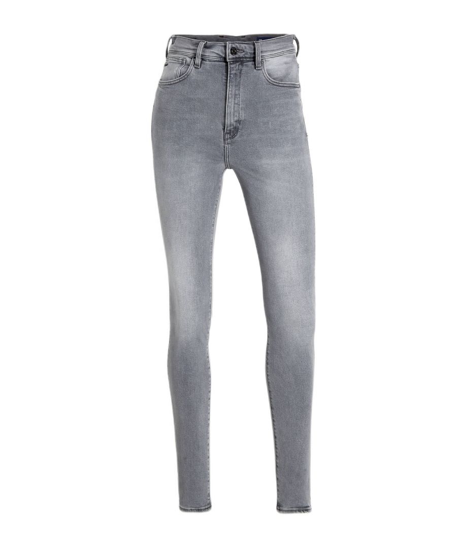 Deze skinny fit jeans voor dames van G-Star RAW is gemaakt van een katoenmix. Het 5-pocket model heeft een hoge taille en heeft een rits- en knoopsluiting.details van deze jeans:•  stijlnaam: Kafey Ultra High Skinny•  5-pocket