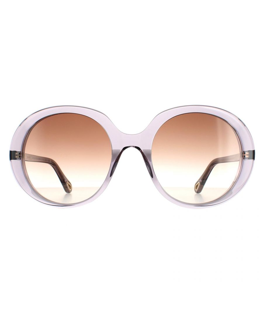 Chloe Oval Womens Transparent Grey Brown Gradient CH0007S  Sunglasses are a glamorous oval style crafted from lightweight acetate. The Chloe logo is engraved into the slender temples for authenticity.