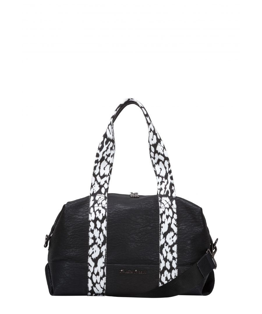 Make a style statement with the dela holdall. The lightly textured exterior meets the statement straps in a monochrome print. Attach the shoulder strap and wear as across the body for versatile styling. The gunmetal hardware gives it a dramatic finish and inside reveals a contrast bright fuchsia claudia canova branded lining. The spacious interior and inner slip pockets provide plenty of space for all your essentials. Features: , lightly textured pu exterior, claudia canova gunmetal script logo, extra long webbed grab handles with padding, detachable and adjustable statement shoulder strap, zip top opening, cut-out heart zip pulls, gunmetal hardware, claudia canova branded lining, inner slip and zip pockets
