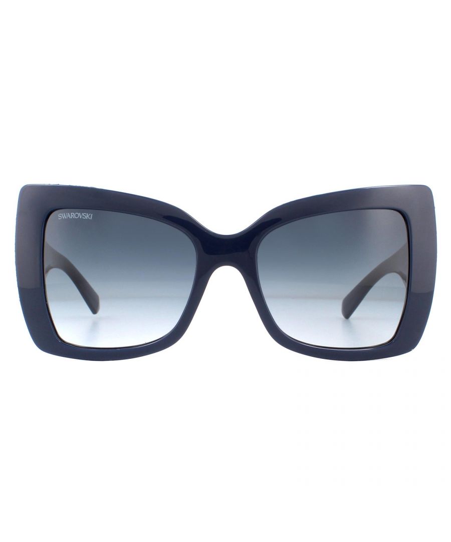 Swarovski Sunglasses SK0203 90W Shiny Dark Blue Glitter Dark Blue Gradient are an oversized butterfly style with chunky temples that feature the Swarovski text logo. The outer edges of the frame front are embellished with diamantes for a sparkling finish.