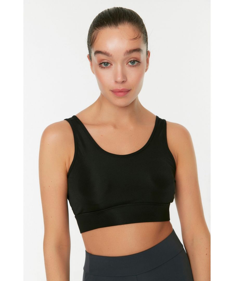 Afmetingen van het model: Hoogte: 1,78, Buste: 82 Taille: 62, Heupen: 89 Het product op de paspop is maat S/36. 90% polyester 10% elastaan, gebreide stof Lengte vanaf schouder 32,5 cm