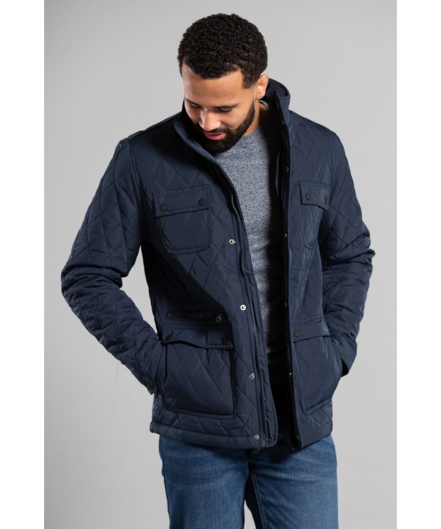 Stay warm and stylish with this padded jacket from Kensington Eastside, featuring a button and zip-up fastening for ultimate comfort. With four front pockets, this jacket is perfect for keeping your essentials close by. Ideal for outdoor adventures or casual wear, it's a must-have addition to your wardrobe this season.