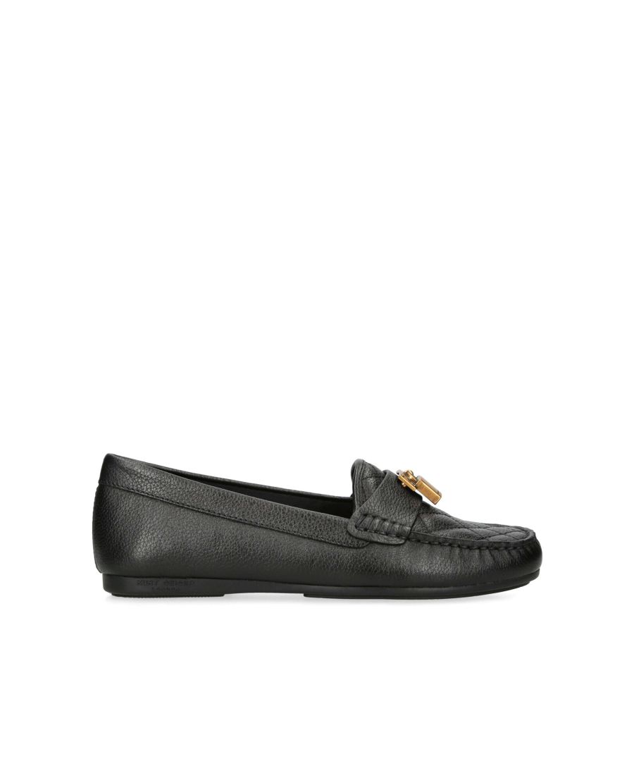 The KGL Brixton Moc is a slip on shoe crafted in textured black leather, The upper features overstitch quilting as well as an antiqued brass padlock on the vamp.