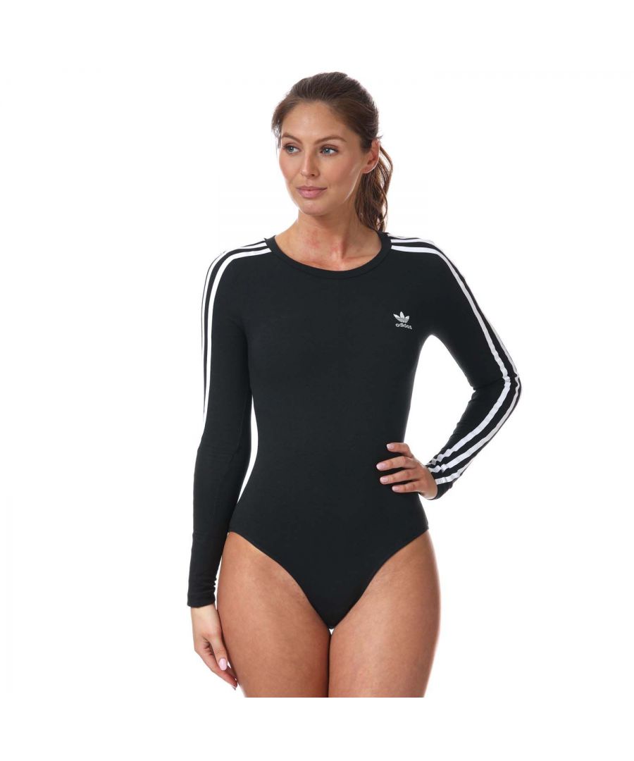 Womens adidas Originals Adicolor Classics Bodysuit in black.- Crewneck.- Long sleeves.- adidas logo embroidery to chest.- 3-Stripes branding.- Cut-out detail to reverse.- Brief back.- Press-stud fastening.- Bodycon fit.- Main Material: 92% Cotton  8% Elastane. Machine washable.- Ref: H35621