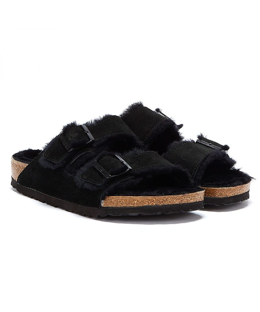 This warm and cosy version of the Arizona sandal boasts plush shearling linings and a suede upper of the highest of quality.  Includes Birkenstock's signature anatomically shaped footbed and a lightweight EVA sole. Boldly stylish, this design is a perfect winter fit.