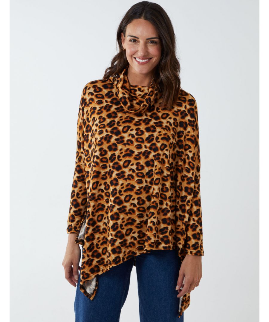 Go oversized this winter with this leopard print top. The shape of this garment compliments any figure shape as it is long and flowing. Works great with jeans and sneakers or dressed up with black heels!\n95% Polyester, 5% Elastane. Machine washable. High neckline. Long sleeve. Approx. length 68 cm unfastened. This item is a ONE size that fits UK 8-14.
