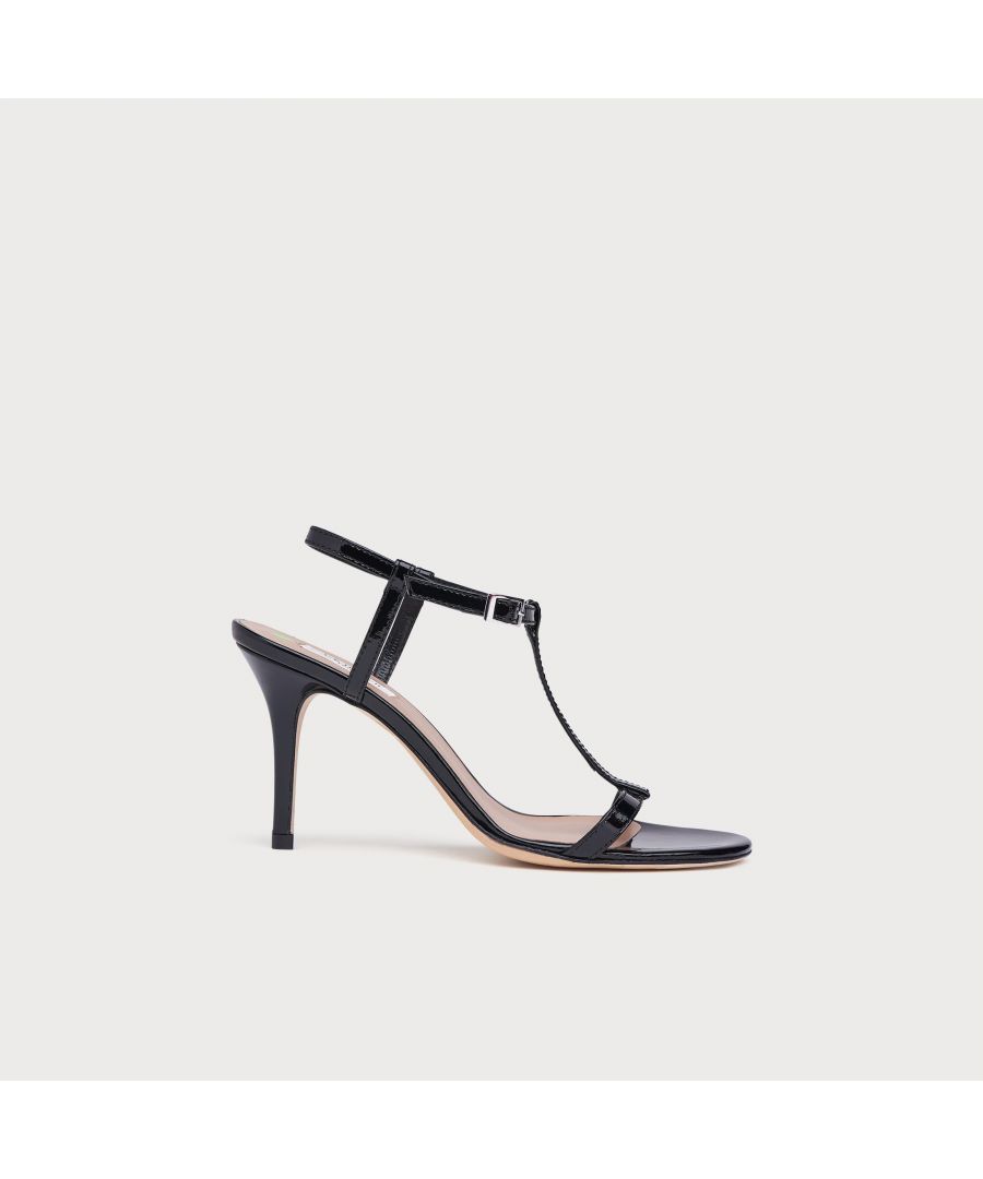 A brand new style for SS20, our North sandals are a chic 'barely there' design. Crafted in Italy from black patent leather, these minimalist sandals have a stylish T-bar, delicate ankle strap and a slender 85mm stiletto heel. They're perfect for the summer occasion season.