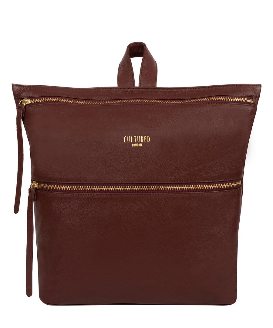 Featuring a stylish and functional design, the 'Addington' backpack from Cultured London's Eco Collection is crafted from premium nappa leather which is soft to the touch. A zip-over top reveals a storage compartment with two slip pockets, lined with 100% cotton. An additional zipped pocket to the front of the backpack provides an extra storage option and comes with adjustable straps and a leather carry handle. Finished with a unique gold foil embossed Cultured London London logo and hanging leather charm.