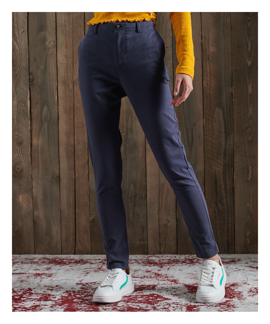 Superdry women's City chinos. These classic chinos feature four pockets, belt loops, and a zip and button fastening. Pair with a shirt or smart top for a classic look suitable for the office, or for everyday wear.