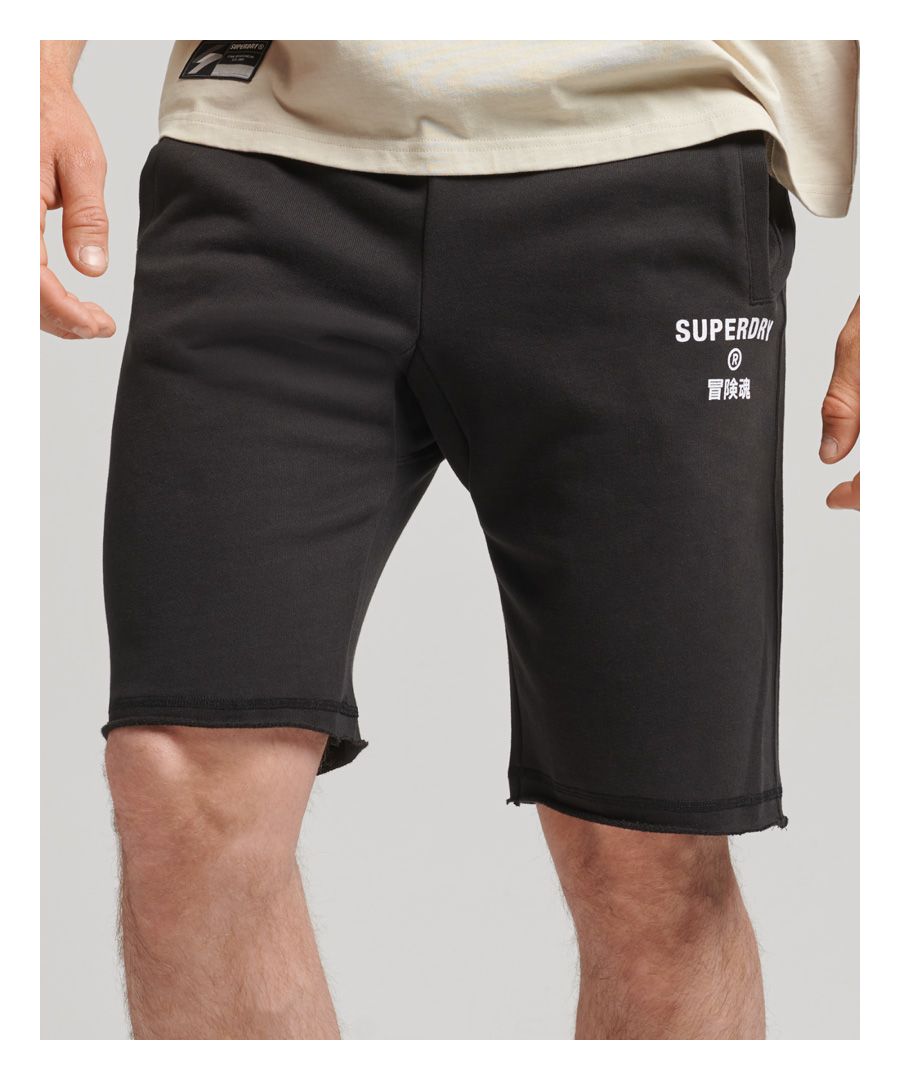 For a comfortable fit, look no further than our Code Core Sports Shorts. The ideal pair, whether you're working out or lounging around, they add a touch of that sporty style to your outfit without compromising comfort.Relaxed fit – the classic Superdry fit. Not too slim, not too loose, just right. Go for your normal sizeConcealed drawstring waistTwin side pocketsUnbrushed liningPrinted Superdry logoPrinted S logo