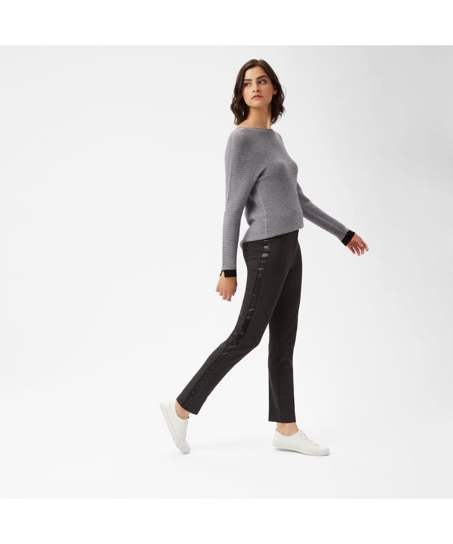 These chic trousers will be your go-to all year round. This season these classics have the added design of a faux leather injected side stripe to give a new twist. Featuring an elasticated waist and tapered cut for a flattering fit. A wardrobe must-have you will turn to over and over, with the additional benefit of being crafted in the highest quality, durable fabric.