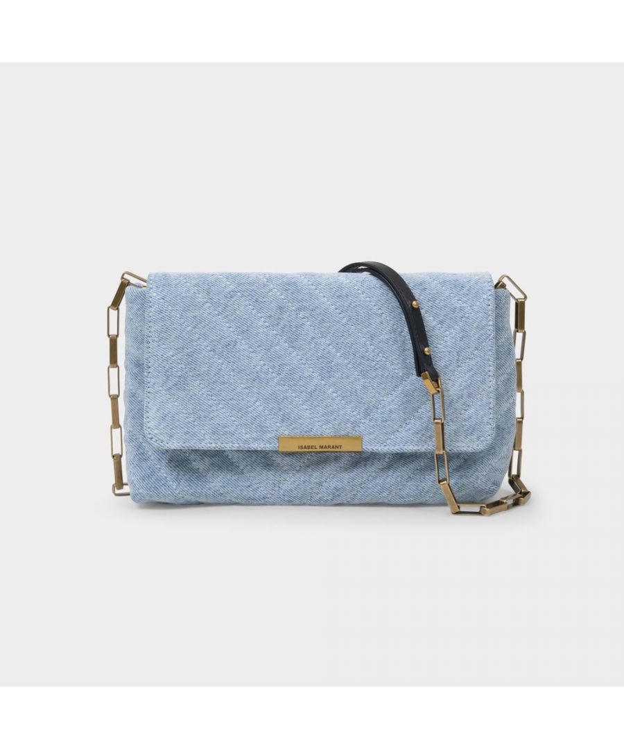 This crossbody bag from Isabel Marant features extremely on-trend chic, graphic quilting. A piece you will want to wear every day, on your shoulder with an oversize blazer like a typical 'Parisienne'. Shoulder strap : 100 cm. Worn on the shoulder - One shoulder chain. Material : Quilted Calfskin. Lining : Cotton. Colour : Bleu - Light Blue. Closure : Magnetic Flap Clasp. Interior : Two flat pockets.