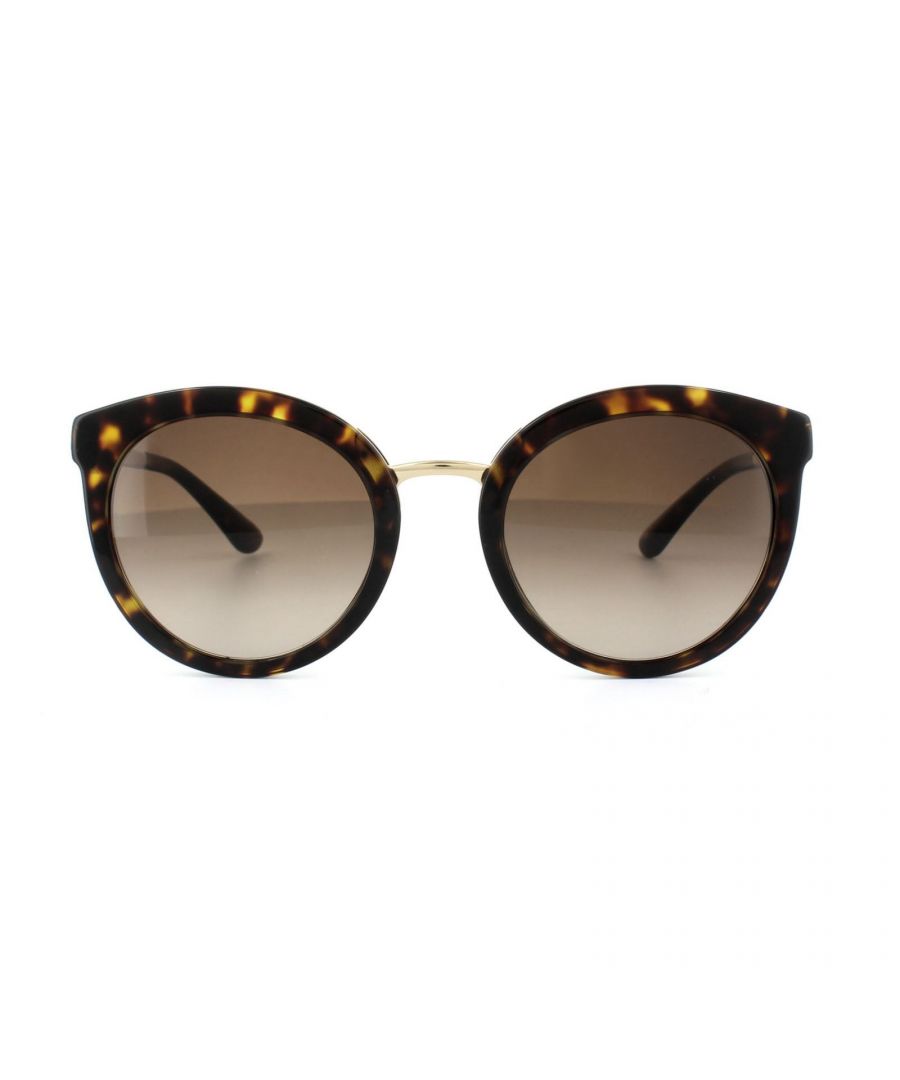 Dolce & Gabbana Sunglasses 4268 502/13 Dark Havana Brown Gradient are an oversized modern take on the classic round sunglasses with a thin metal bridge and temples joining the premium acetate frame and temple tips. The Dolce & Gabbana logo is lasered into the temples for a classy finish.