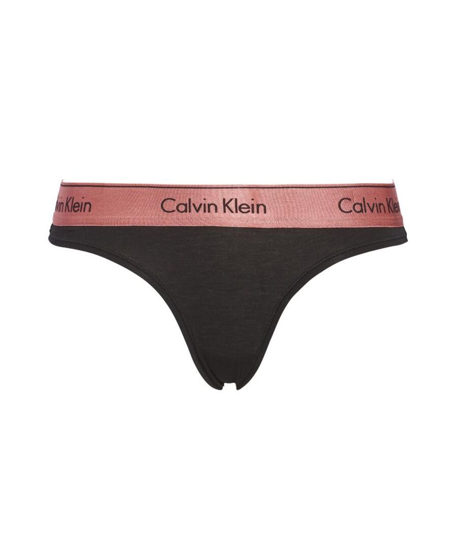 Calvin Klein is iconic for its lingerie and its recognisably premium athleisure style. This thong flaunts the timeless Calvin Klein waistband for a statement designer look. A classic thong cut offers minimal coverage and creates a seductive shape. The medium-rise elastic waistband and stretch fabric offer the utmost comfort that is perfect for everyday wear. Complete the look with matching items available by Calvin Klein.\n\nIconic Calvin Klein waistband\nSoft stretch fabric\nMinimal thong shape\nMedium rise waistband\nComposition: 53% Cotton | 35% Modal | 12% Elastane\nListed in UK sizes