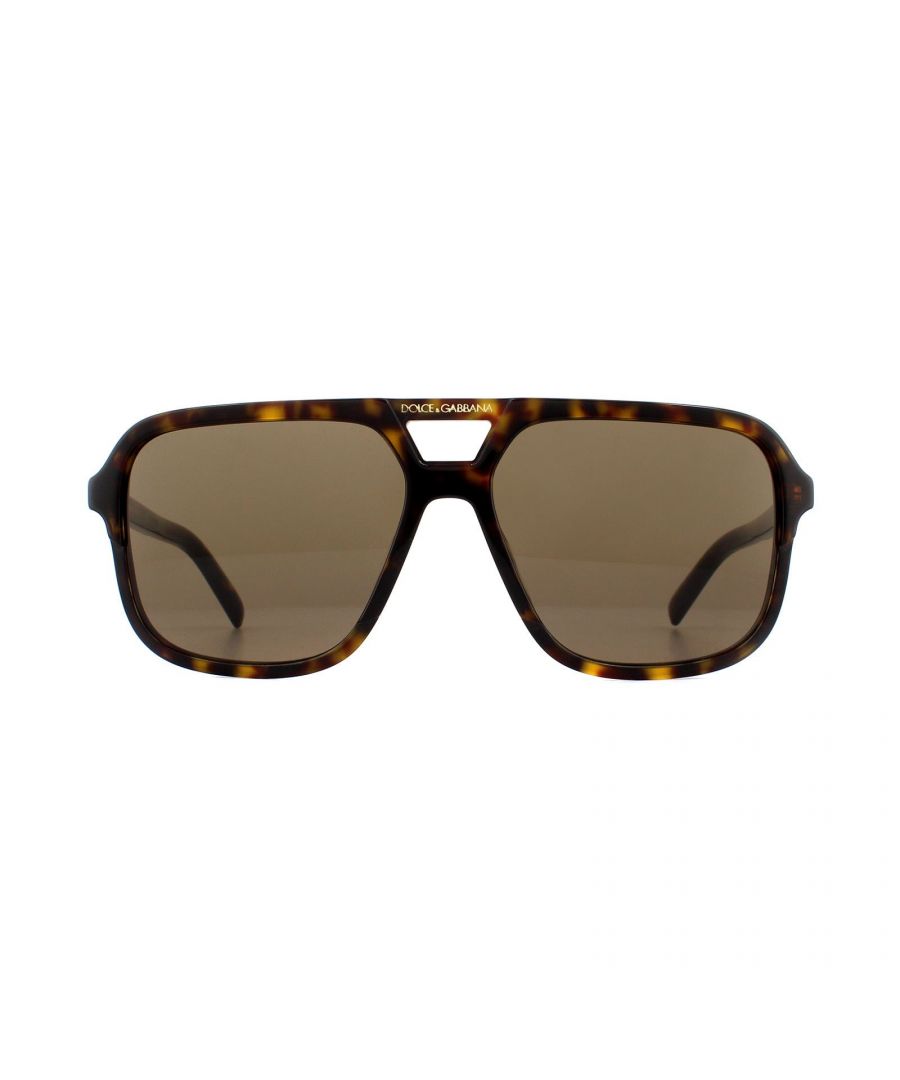 Dolce & Gabbana Sunglasses DG4354 502/73 Havana Brown Gradient are a full acetate square style aviator for men. The lightweight frame features the Dolce & Gabbana text logo on each of the hinges an d the brow bar. The DG logo is also featured at each of the temple tips. The 4354 are a sleek and contemporary style that will guarantee you stand out from the crowd!