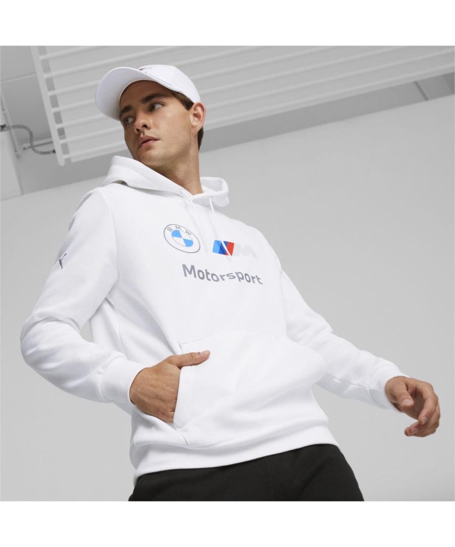 PRODUCT STORY There's nothing more essential in a man's wardrobe than a hoodie. And there's nothing cooler than embodying the spirit of a classic motorsport brand. Enter the BMW M Motorsport Essentials Fleece Hoodie. The chest is emblazoned with a graphic print for maximum attention. Be sure to adjust the hood as you like it for complete wearing comfort. FEATURES & BENEFITS : Cotton: Cotton in PUMA products comes from farms with a focus on sustainable farming such as water efficiency and soil health protection. Learn more: https://about.puma.com/forever-better Recycled Content: Made with at least 20% recycled material as a step toward a better future DETAILS : Regular fit Ribbed cuffs and hem Jersey-lined adjustable hood BMW M Motorsport graphic print on chest Brushed jersey