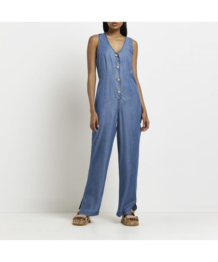 > Brand: River Island> Department: Women> Material: Lyocell> Material Composition: 100% Lyocell> Type: One-Piece> Style: Jumpsuit> Size Type: Regular> Fit: Regular> Neckline: V-Neck> Sleeve Length: Sleeveless> Leg Style: Wide-Leg> Pattern: No Pattern> Occasion: Casual> Selection: Womenswear> Season: SS22