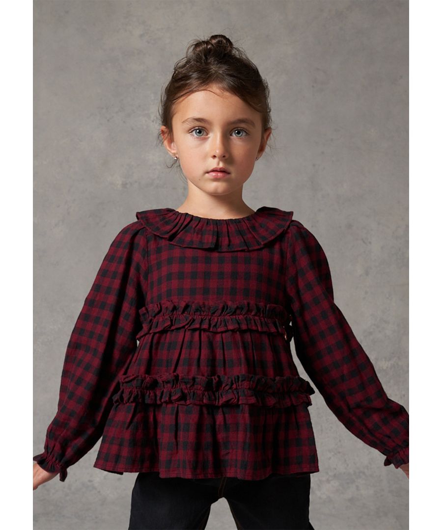 Check me out! This scrumptious check blouse will be your go to this season - wear with high shine leggings and stomper boots or flippy skirts and sneakers.  Angel & Rocket cares: made with fairtrade cotton.   Colour: Crimson  About me: 100% cotton  Look after me: think planet  wash at 30c      