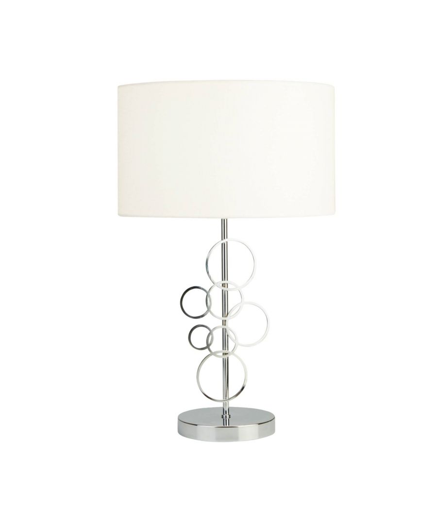 Modern polished chrome table lamp boasting a white shade \n\nFreshen your home interior with the beautifully modern Barnum table lamp, exclusive to Pagazzi. Boasting white drum shade, this polished chrome table lamp is complete with contemporary circles. Freshen up your living room, hallway or bedroom with this versatile floor lamp.\n\nHeight: 50cm \nDiameter: 33cm \nMaximum Wattage: 60w \nBulb: 1 x E27 Light Bulb (Not Included)