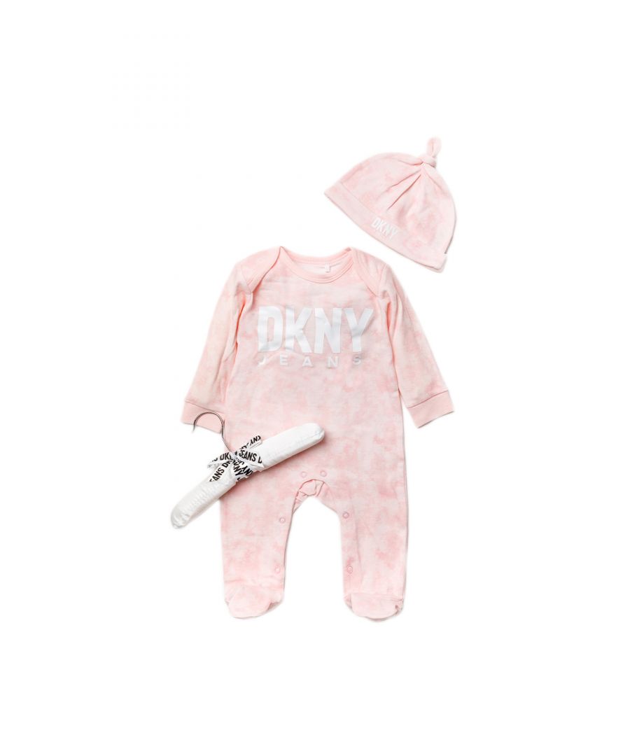 This adorable DKNY Jeans two-piece set includes a printed sleepsuit, and a matching hat with the DKNY Jeans logo. The set is cotton, with popper fastenings, keeping your little one comfortable. This set is packaged with a matching padded hanger making it the perfect gift for the little one in your life.