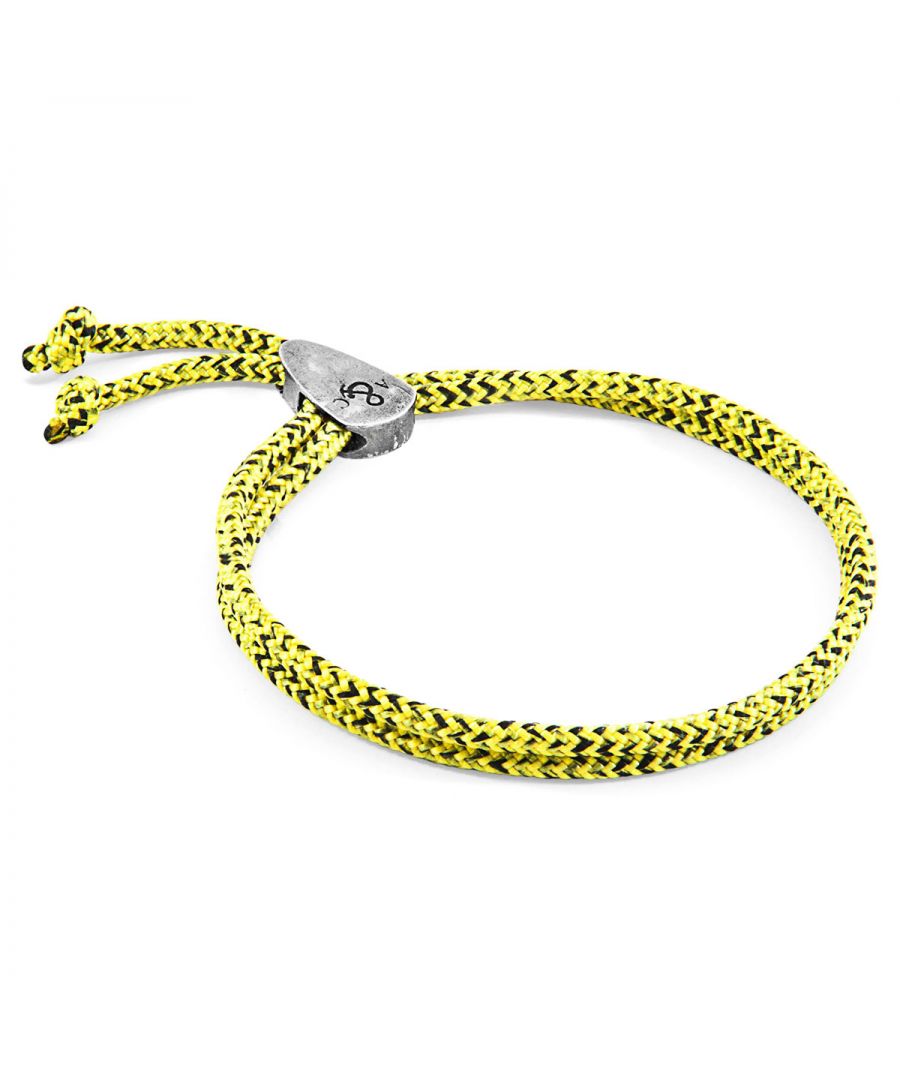 The Yellow Noir Pembroke Silver and Rope Bracelet was both designed and skilfully handcrafted completely in Great Britain, In Quality We Trust. For the Modern Journeyman (and woman), ANCHOR & CREW takes ownership of an exploratory lifestyle and enjoys the Happy-Good Life. Combining British craft manufacturing with a discerning modern-minimalist style, this ANCHOR & CREW bracelet features:\n\n3mm diameter performance Marine Grade polyester and nylon rope (GB)\nSolid .925 sterling silver divider pulley (GB) \n\nSIZING\nThis bracelet is one size fits all, with the rope able to extend or tighten to suit your wrist size. To take the bracelet on or off your wrist, simply push or pull the dividing slider along the rope to make the wrist-gap smaller or larger.