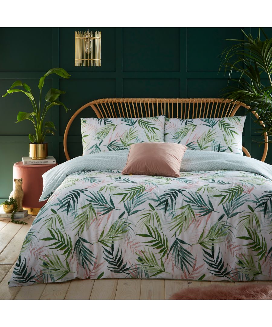 Add an exotic, summery vibe to your bedroom with the Bali Palm reversible duvet cover set featuring swathes of palm leaves in jungle greens and pinks. With a calming geometric print reverse, for a fresh and versatile alternative.
