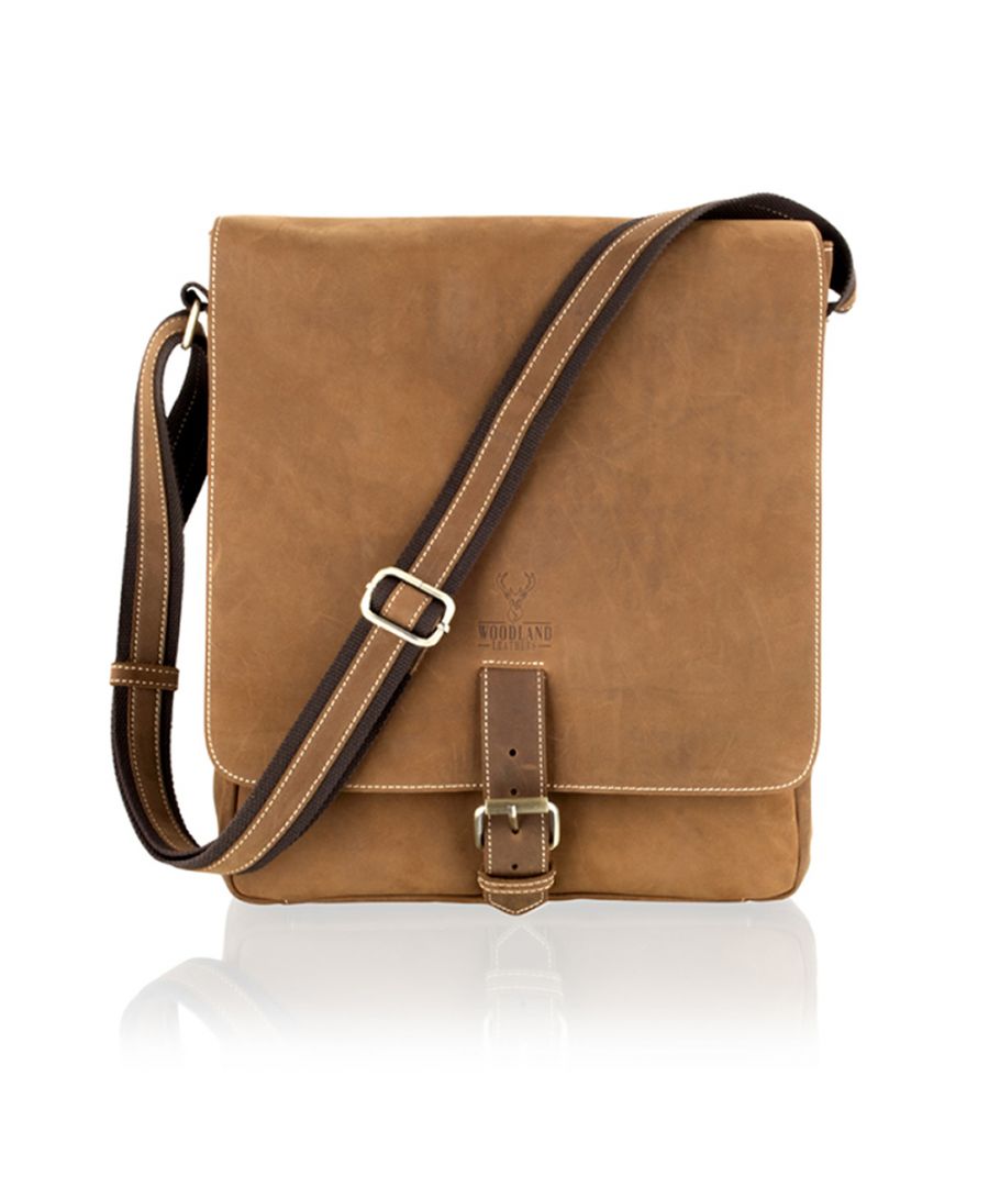 This is a new addition to the Woodland Leather range a very large messenger bag capable of holding a 14.0” laptop comfortably. Made from super soft sandy brown nu buck leather. Buckle style belt opening for added security. Open the flap to reveal a central compartment and an additional pocket to the front. A further zip pocket above. Internally there is a laptop section and the standard mobile pockets. Dimension: H(36cms), L(30cms), D(9.0cms).