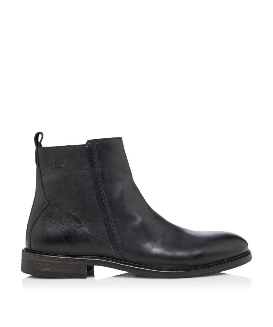 Bertie's Cornfield ankle boot is a rugged addition to a casual wardrobe. Showcasing distressed detailing along with a burnished toecap. It fastens with a zip at the side and is set on a raised stacked heel.