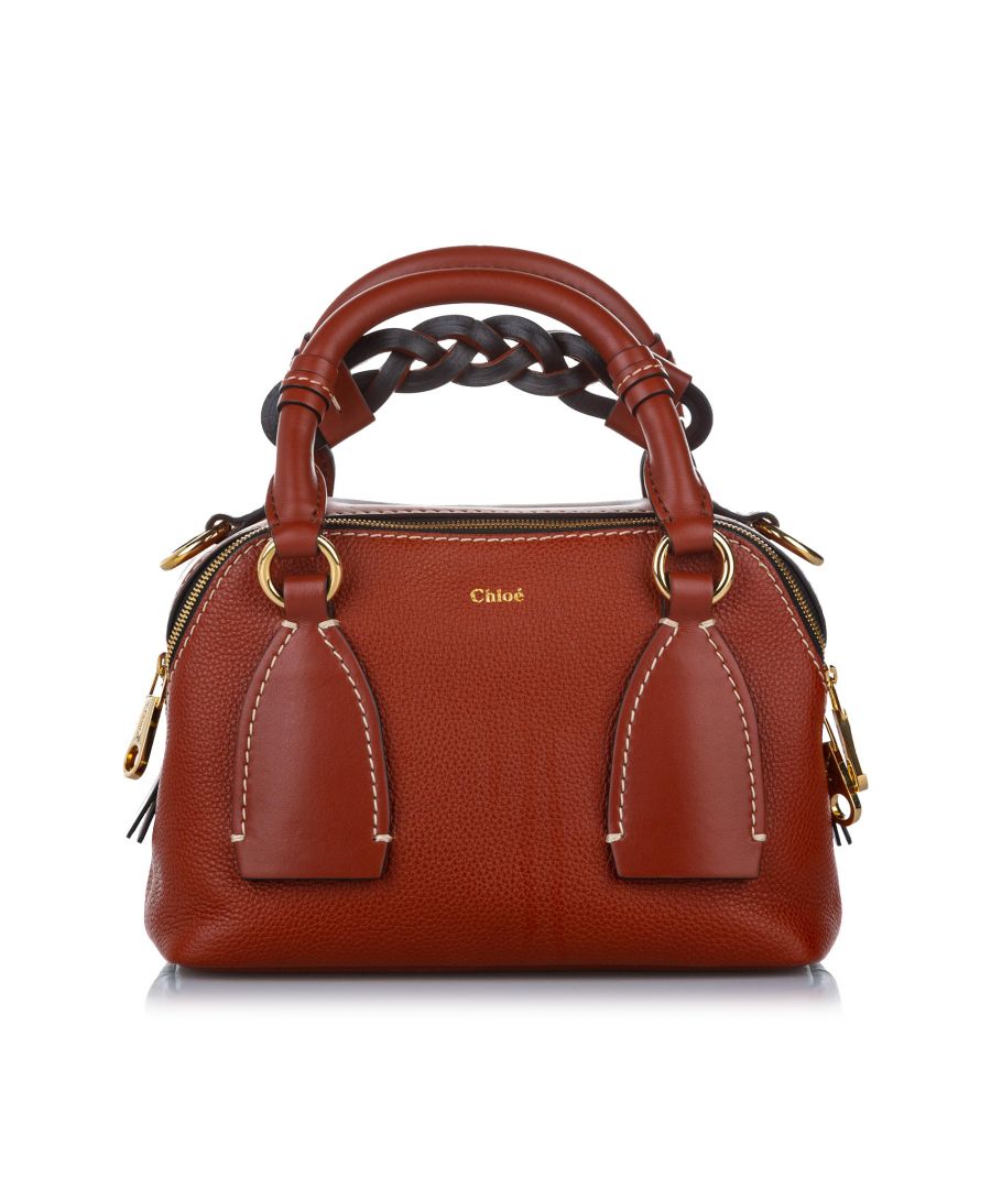 VINTAGE. RRP AS NEW. The Daria features a leather body, a flat top handle, a flat leather strap, and dual top zip closures.\nDimensions:\nLength 16cm\nWidth 24cm\nDepth 11cm\nHand Drop 4cm\nShoulder Drop 50cm\n\nOriginal Accessories: Shoulder Strap, Dust Bag\n\nSerial Number: 0220706502\nColor: Red x Maroon\nMaterial: Leather x Calf\nCountry of Origin: ITALY\nBoutique Reference: SSU105386K1342\n\n\nProduct Rating: GoodCondition