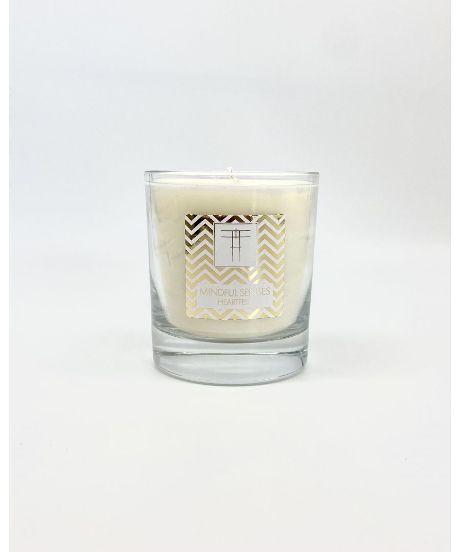 Created to create a calm and restorative enviroment, Mindful Senses Candles are emotive triggers of colour, scent and mood. Silence the outer work and invite a moment of intimacy within your private sanctum with this tender and tranquil Heartfelt candle. With notes of peach, lily, jasmine, sandalwood, vanilla, ylang ylang and amber, this Mindful fragrance restores your inner spirit and softens the soul.\n\nSize 300cl 45+ Hour burn time.