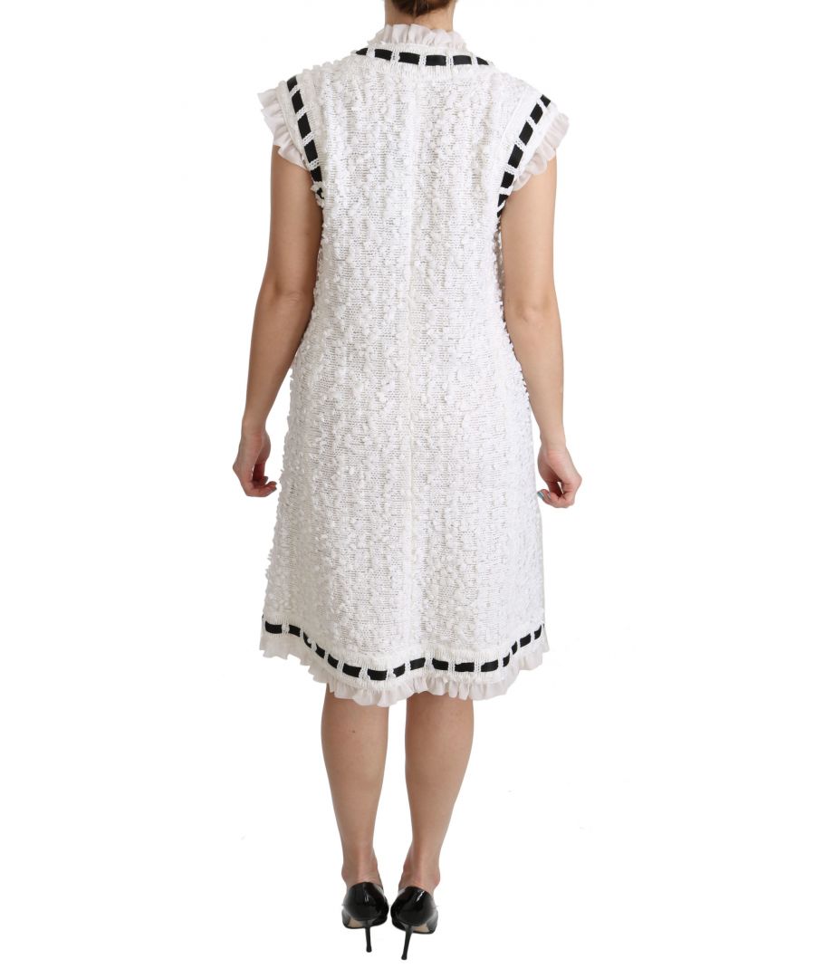 DOLCE & ; GABBANA Superbe gilet de costume neuf avec étiquettes 100% authentique Dolce & ; Gabbana Couleur : Noir Modèle : Gilet de costume formel Matériau : 98% laine vierge 2% élasthanne Fermeture à quatre boutons sur le devant Deux poches avant Détails du logo Fabriqué en Italie