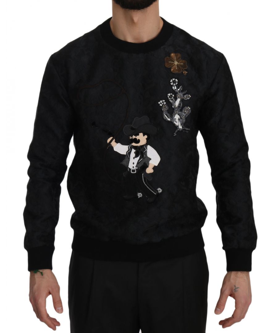 Dolce & ; Gabbana   ; Absolutely stunning, 100% Authentic, brand new with tags Dolce & ; Gabbana Sweater Model : Crew Neck Pullover Sweater Color : Black Brocade Cowboy Embroidered Logo details Made in Italy Very exclusive and high craftsmanship Material : 47% Polyester 28% Silk 25% Acrylic Lining : 100% Cotton