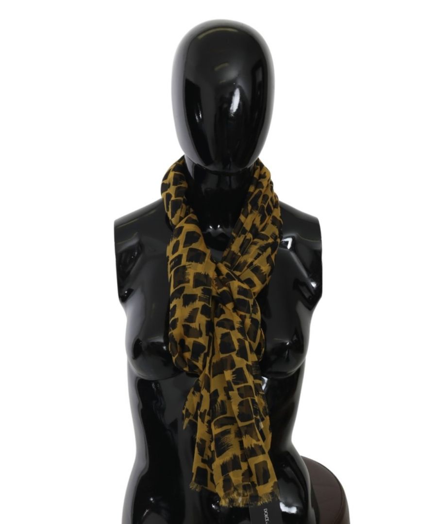 DOLCE & GABBANA Prachtige gloednieuw met tags, 100% Authentic Dolce &; Gabbana vrouwen sjaal met patroon print gemaakt van zijde. Geslacht: Vrouwen Kleur: Geel en zwart Materiaal: 100% Zijde Logo details Made in Italy Maat: 66cm x 200cm