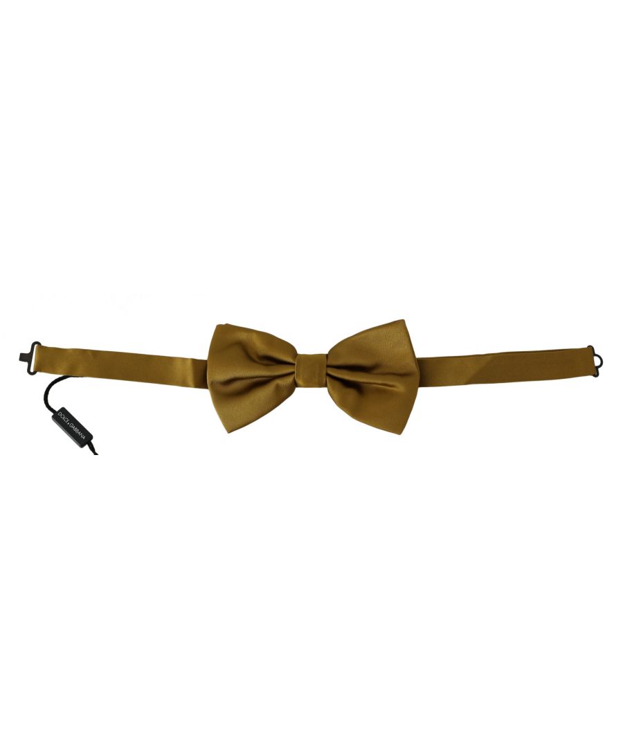 Nœud papillon DOLCE & ; GABBANA Absolument superbe, 100% authentique, neuf avec ses étiquettes Nœud papillon exclusif Dolce & ; Gabbana. Cet article provient de la collection exclusive Dolce & ; Gabbana. Couleur : moutarde, jaune Modèle : noué Matériau : 100% soie Sangle de cou, taille unique Made In Italy