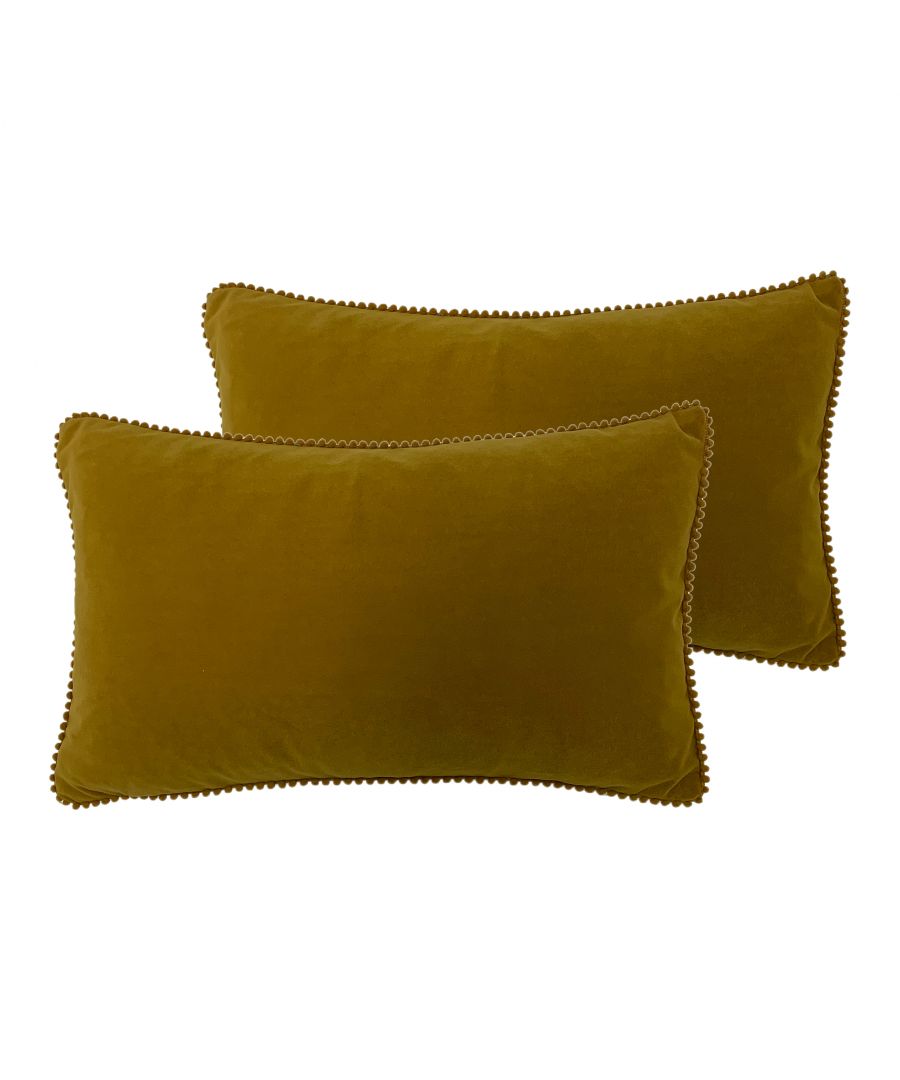 Add a little texture to your living room or bedroom this season with our beautifully soft velvet pom pom cushions. Finished in soft spring colours this cushion design would be perfect for any interior.