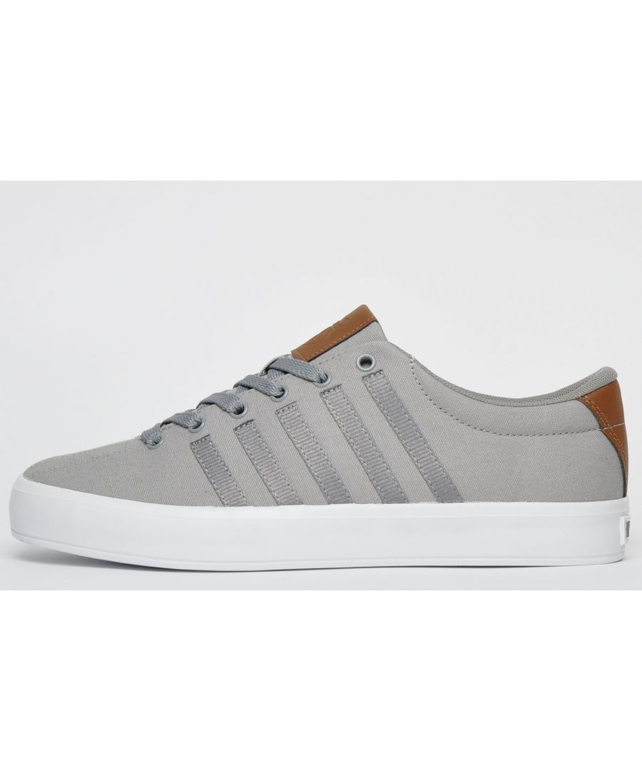 <p>The K Swiss Court Pro II Vulc is a classic low-top trainer constructed in a luxe grey canvas textile upper with the brand's iconic 5-stripe design adorning the sides with consummate ease, delivering a pristine designer look which anyone would be proud to wear.</p> <p>K Swiss trainers combine quality, style and performance all rolled into one and this K Swiss Court Pro Vulc is no exception, with its intricate decorative stitch detailing and traditional lace up fastening to keep your feet firmly in place, this is a trainer that will take you from day through to the night in style and comfort.</p> <p> - Mix canvas textile upper </p> <p>- Intricate detailing delivers a designer look </p> <p>- Stylish on-trend grey colourway </p> <p>- Cushioned insole for increased comfort and support</p> <p> - Up-front lacing system delivers a safe and secure fit</p> <p> - K Swiss branding throughout.</p>