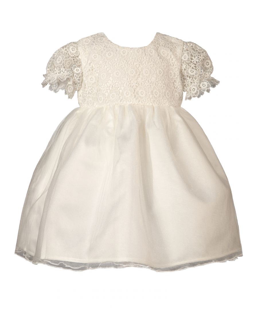 Lacy - a stunning dress that your little girl will look adorable in.\nA short sleeve Ivory special occasion dress, ideal for christenings, flower girl and other special occasions.  The sleeves and bodice are made in a guipure lace with a flower design and complimented by a dreamy skirt made with layers of organza over a 'mock silk' underskirt.  We've added a 100% lightweight Cotton lining making it more comfortable to wear and better for girls with sensitive skin.\nAll our dresses are hand finished and arrive with you on a Satin covered padded hanger and then protected by one of our Heritage garment keepsake bags.  \nOuter - 100% Polyester\nLining - 100% Cotton\nDry Clean or Hand Wash
