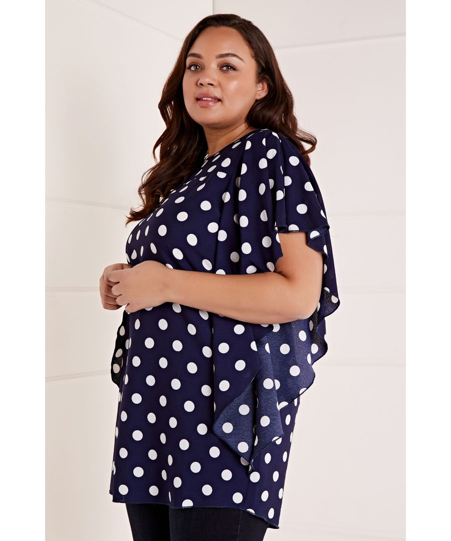 A spot on look for work and weekends, make this Mela Navy Plus Size Spotted Frill Top. In a relaxed shape, the silky-soft fabric drapes over your curves and sits below the hips. Ruffles fall from the short sleeves to create a flattering silhouette, the polka-dot print adds a classic tone to your look.  Shell: 100% Polyester Machine Wash At 30 Length: 91.5 cm Model Wears Size 16