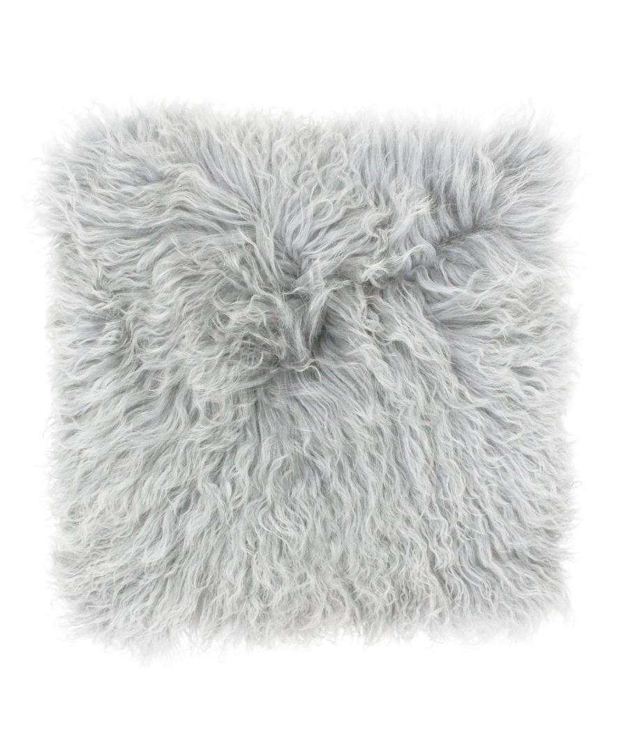 Irresistibly gorgeous the Mongolian cushion cover is an absolute dream to own. Washed fur in subtle colours is a trending fabric and can be found in the homes of some of the most influential people. Made from 100% natural sheepskin fur you'll be running your hands through its softness for years to come. The face of this cushion has a deep pile, fur front in a range of soft pastel colours while the reverse is made of soft faux suede in colour-coordinated tones. Complete with knife edging and a zip closure, concealed with a strip of fabric, this cushion is unbelievably cosy and will work perfectly on sofas and beds. Versatile and adaptable this cushion cover can be worked into a range of interiors such as a minimalist bedroom display or to add a soft touch to a leather sofa. Please note fur texture ranges and may appear curlier or straighter to image. To ensure this cushion will last for years to come treat it carefully and dry clean only. Do not iron and lay flat to dry for the best results.