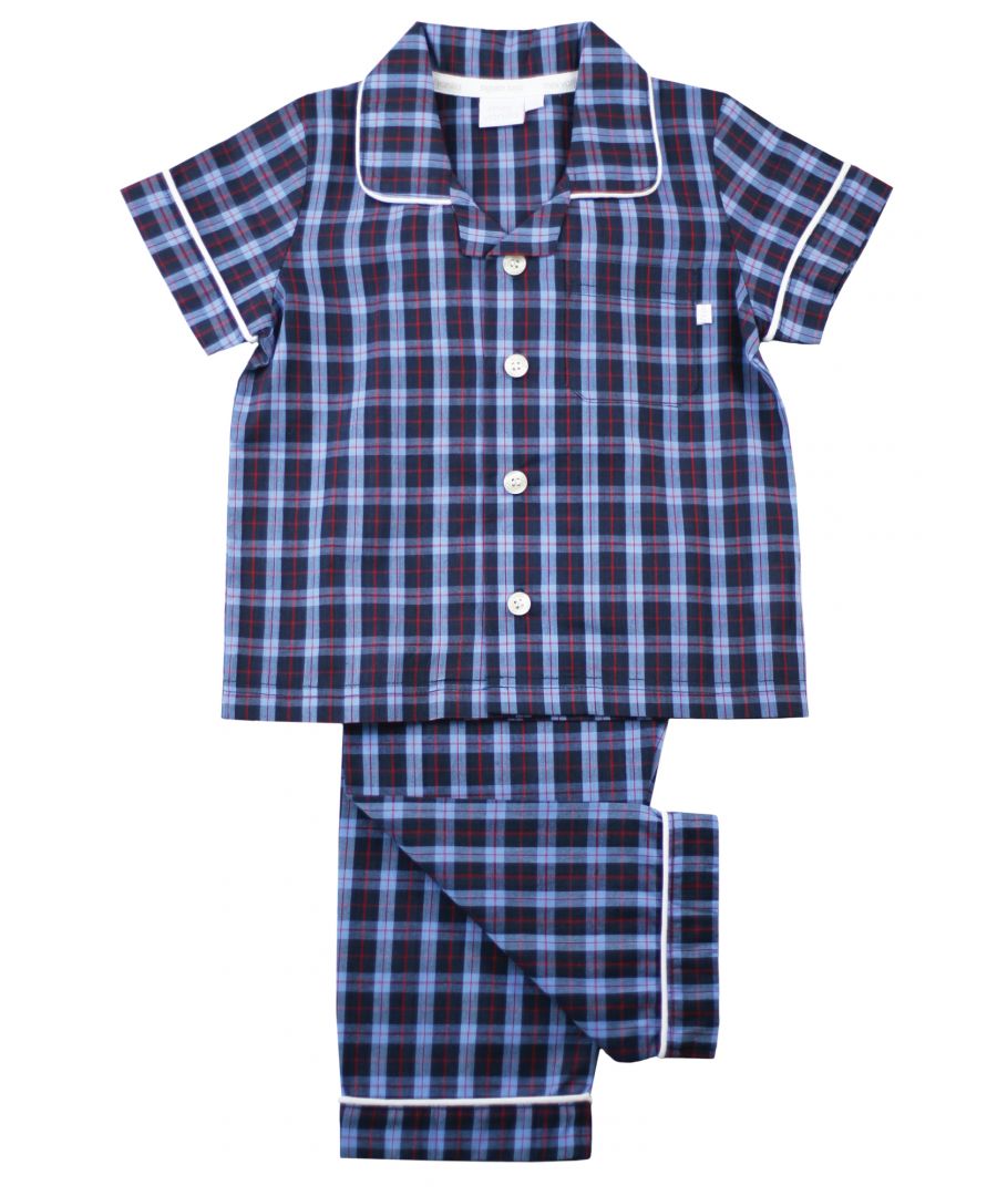 There’s no such thing as a basic check at Mini Vanilla! In our Short sleeve crisp summer cotton boys pyjamas we’ve blended navy with blue and red to create a  traditional look that’s perfect for lounging or sleeping. Made from super-soft 100% crisp cotton. The set is trimmed with white cotton piping. The top has an open collar and revere, single square pocket with MV tab and fastens with Mini Vanilla Engraved buttons. The crisp cotton comfy trousers have a fully soft elasticated waist and white piping at the hem to finish this very traditional boys pyjamas