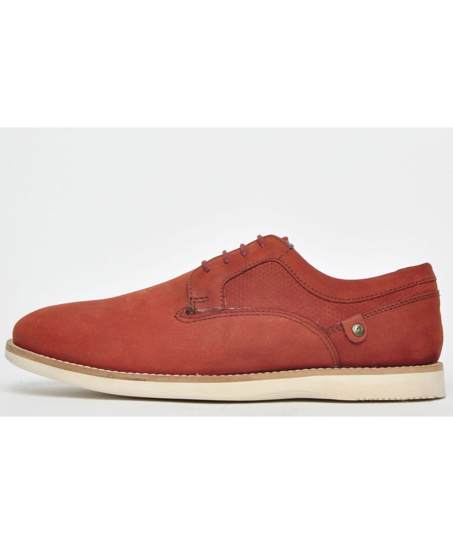 <p>Perfect for casual or formal wear, these Red Tape Holker men's lace up leather derby shoes are sure to smarten up your everyday or formal outfit. These classic derby shoes are crafted from a soft nubuck leather in a burgundy colourway, 4 hole lace up closure and finished off with an equally soft insole for added comfort all day round, Red Tape have created a true must have derby shoe for this season.</p><br><p>- Premium nubuck leather upper</p><p>- 4 Hole lace up closure</p><p>- Slim durable outsole</p><p>- Padded footbed</p>- Red Tape branding<br>