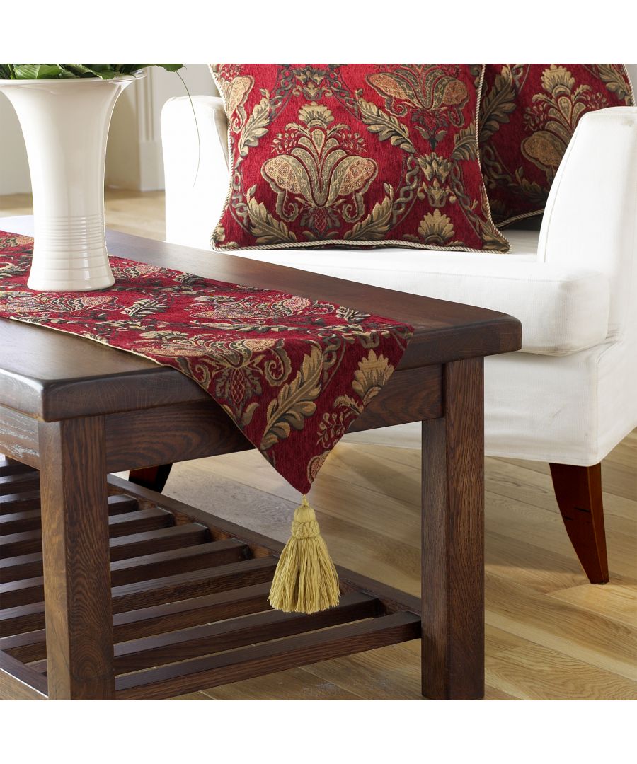 The Shiraz range is the height of opulence. Each piece has an embroidered damask pattern in delicate gold, presented on burgundy red, chenille-style fabric. The Shiraz table runner will dress up your dining table, instantly adding elegance to your dining room. With two large golden tassels on each end and a gold reverse this table runner will elevate any dinner party. This luxurious runner must be treated carefully and is only appropriate to dry clean.