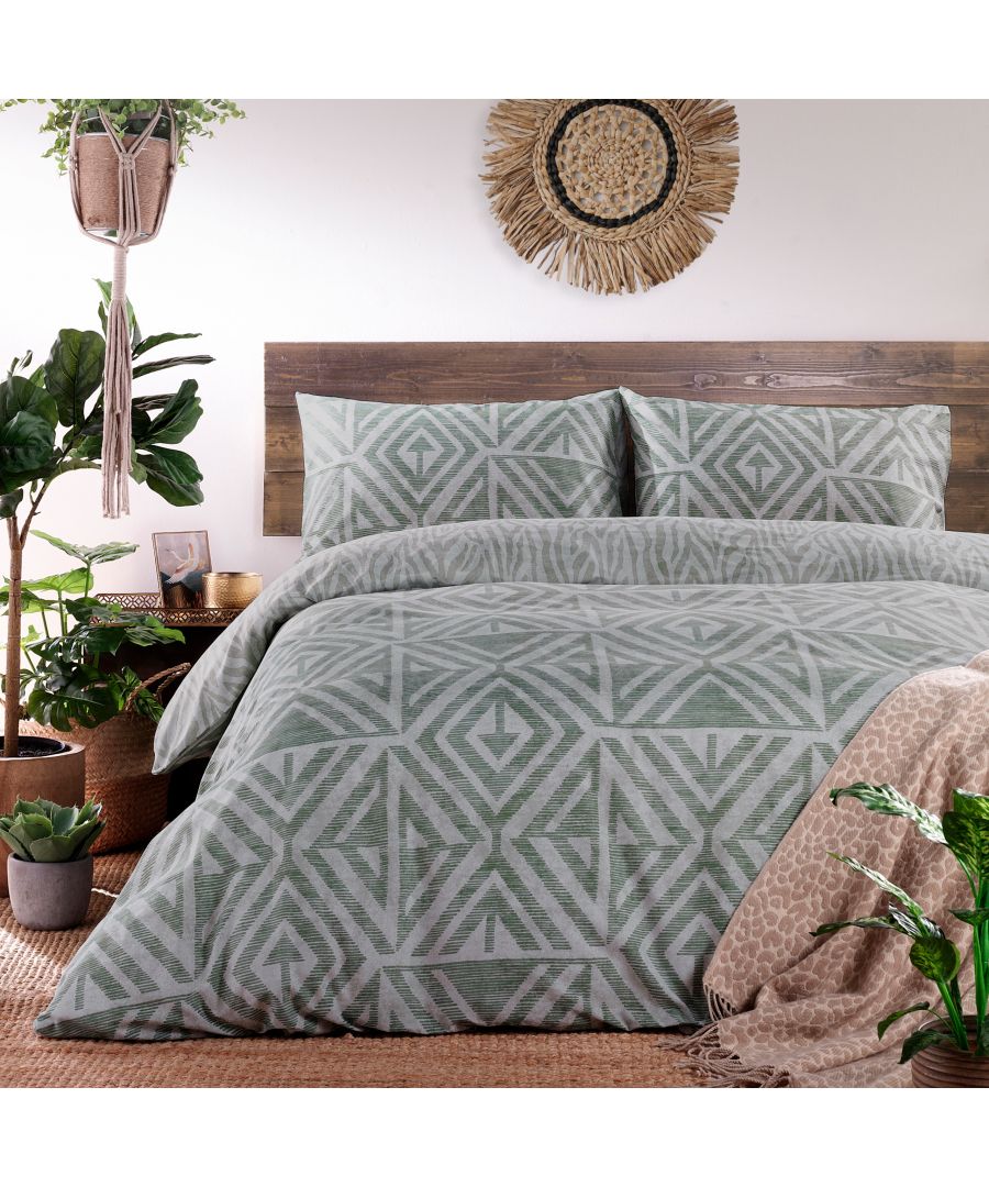 A soft, global-inspired geometric print - perfect for adding texture and warmth to your bedroom. Featuring a tonal animal print reverse print, for a softer alternative when you need it.
