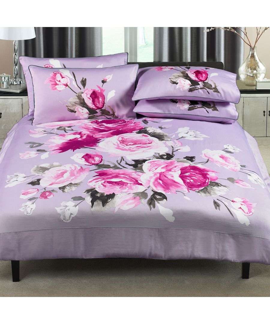 With its strong oriental inspiration, add a burst of floral luxury to your bedroom with the Windsor duvet cover set. Created from the highest quality, 300 thread count sateen cotton, both the duvet cover and pillowcases are silky soft, making it an absolute pleasure to tuck yourself into each night. The large scale floral bloom dominates this beautiful bed linen, which will instantly transform the look in any bedroom setting to create a colourful, vibrant interior display. Each duvet has a secure button closure and comes with fully matching envelope-style pillowcases. For the best finish machine wash at 60 degrees and iron on a hot setting.